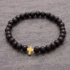 By Gabay, Armbånd med træperler og Guldkors, Ø 21 cm