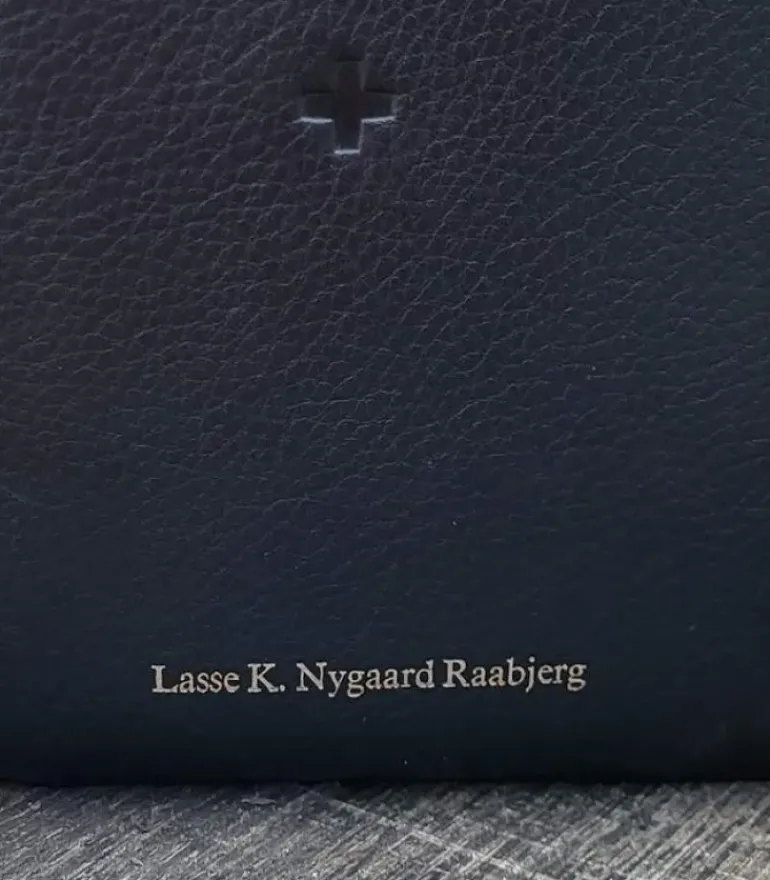 Tryk på bibel eller salmebog
